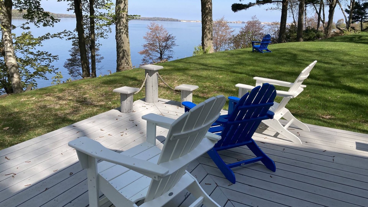 Ludington House | Stunning view of Hamlin Lake, w/deck, fire-pit, screened in porch. Sleeps 6.