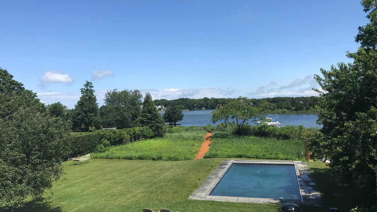 Sag Harbor House | Stunning Waterfront 4 Bedroom Home with Pool, a Dock, an Acre of Land & a Boat