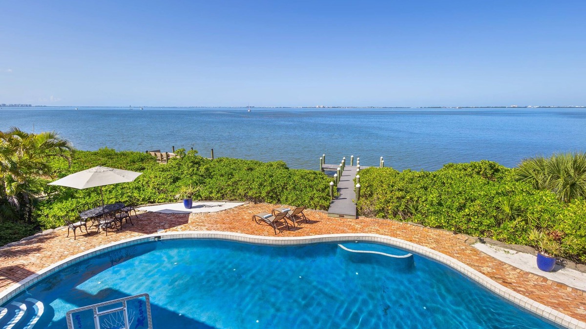 Bayshore Gardens House | Stunning waterfront retreat w/panoramic view, spectacular sunsets & Heated pool