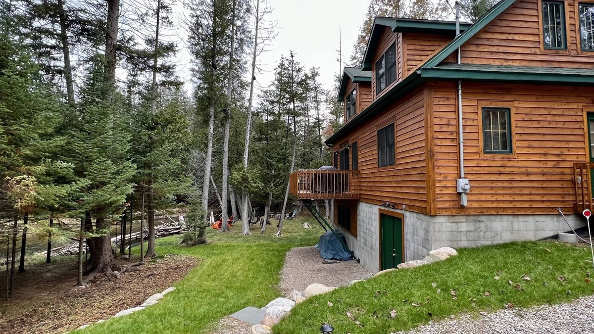 Cheboygan County Cabin | Sturgeon Riverfront Cedar Cabin