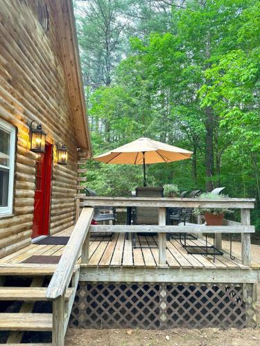 North Creek Ski Chalet | Stylish Forest Lodge with Large Hot Tub, Firepit and Fireplace minutes to Gore Mountain