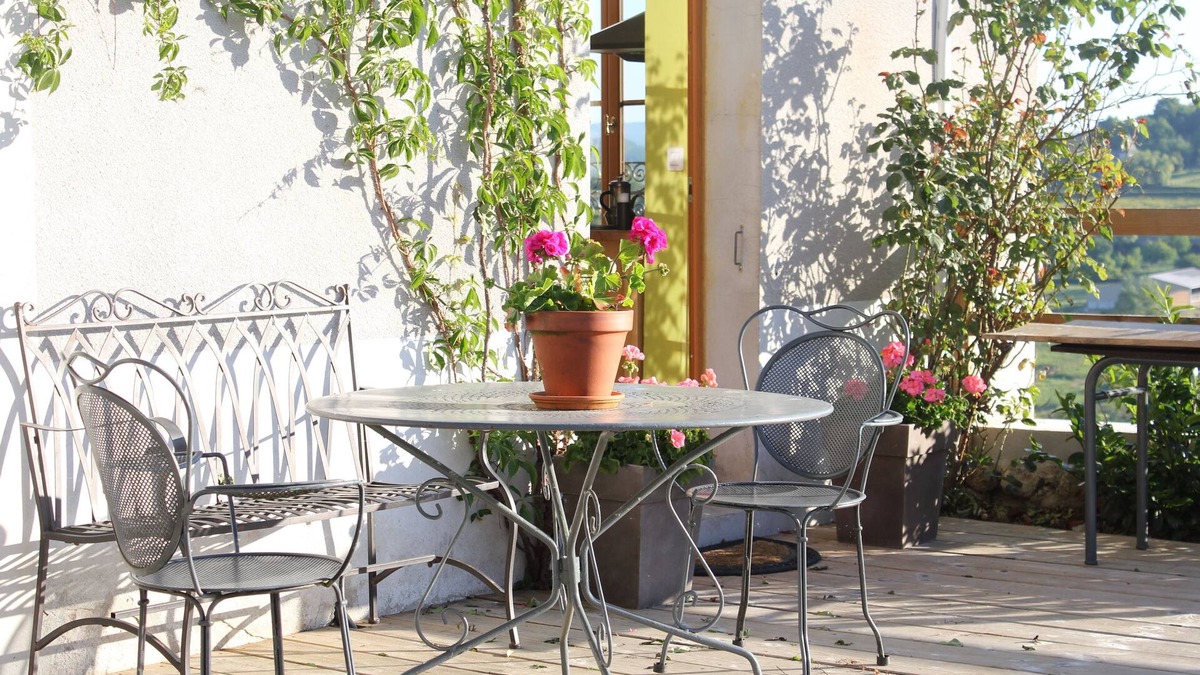Saint-Didier-sur-Arroux House | Stylish living in the village square with a large terrace overlooking the Morvan