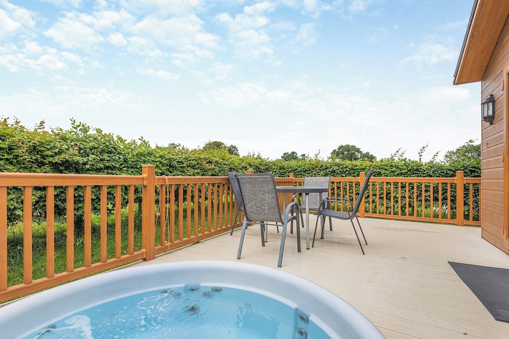 Halfway House Ski Chalet | Stylish luxury lodge with hill view.