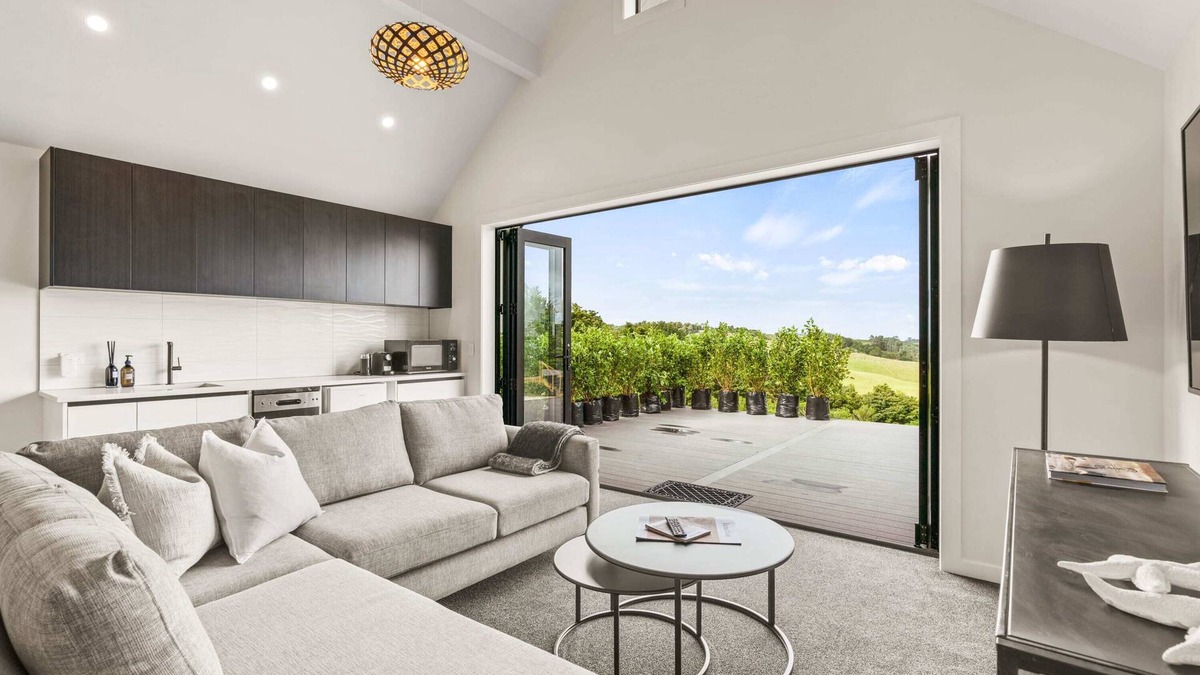 Mangawhai Villa | Stylish Space with a Green Rural outlook peaking to the Mangawhai Sand Dunes and