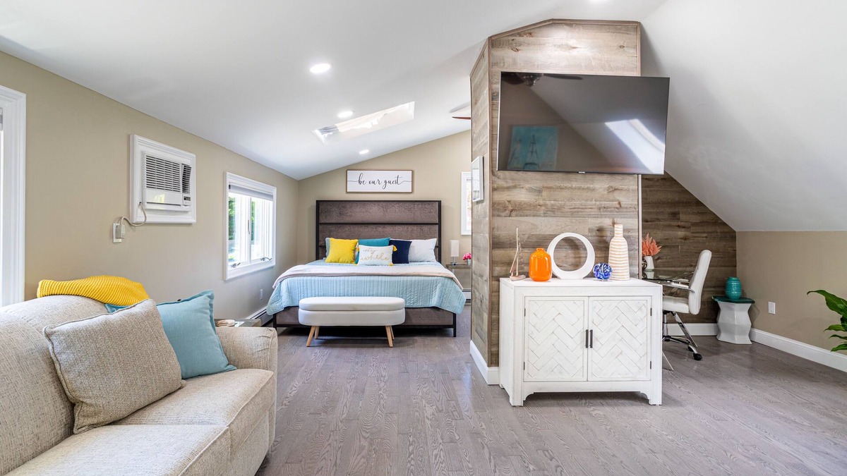 Huntington Station Apartment | Stylish Upscale Apt w/Snack Bar & Sunny Deck