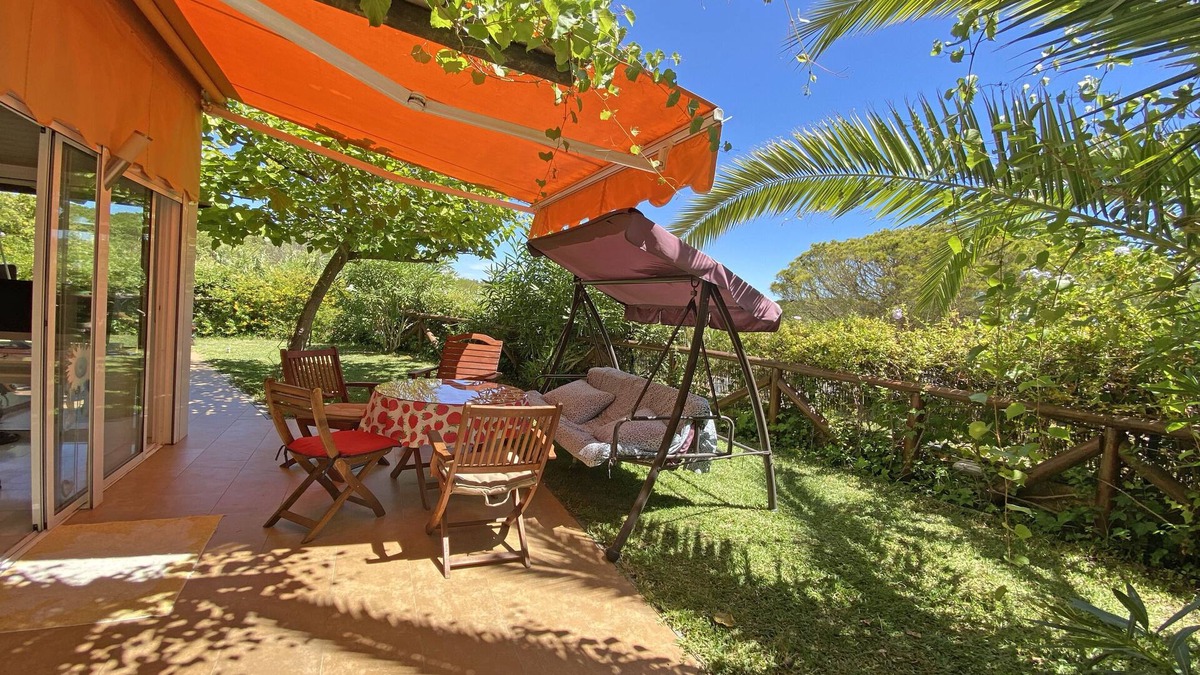 Islantilla Apartment | SUN, NATURE AND BEACH. Cozy, bright, large garden with views of pine forests