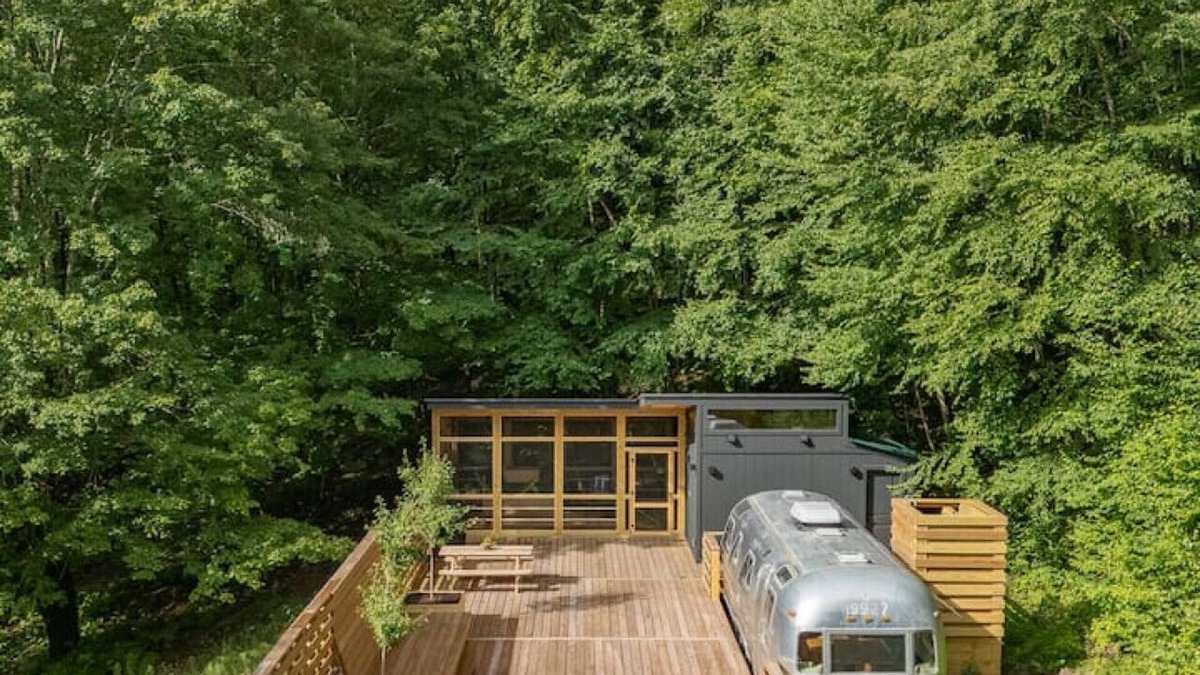 Delancey House | Sunlit Airstream in Trees with Expansive Deck + Nature Views