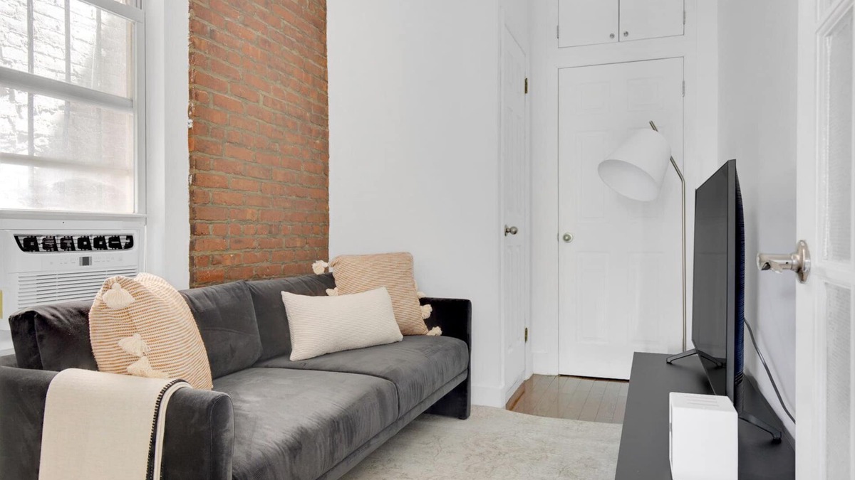 Chinatown Apartment | Sunlit LES 1BR w/W/D, steps to B/D train, by Blueground