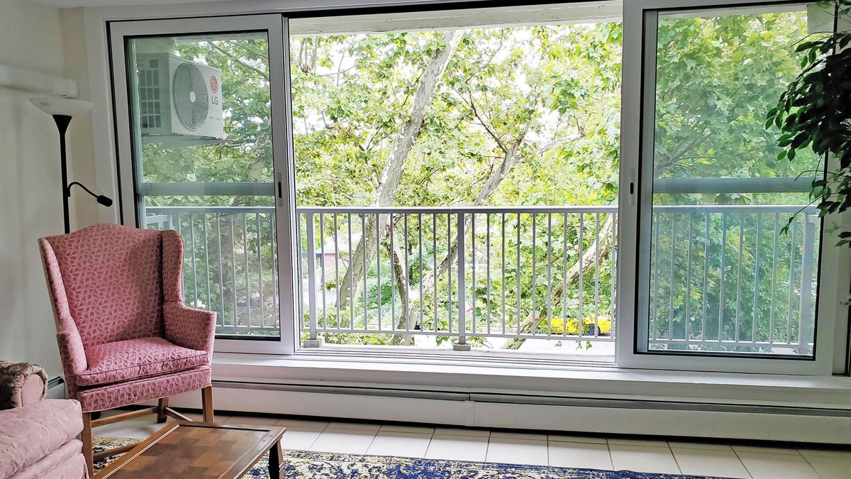 Queens Apartment | Sunny 1-bedroom apartment in Bayside, close to restaurants, shops, and train.