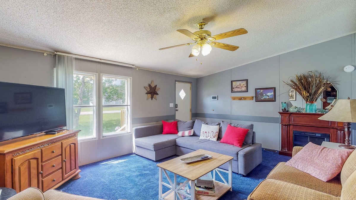 Alvin House | Sunny Acreage - Prime Location Home with Beautiful Yard & Recent Renovations