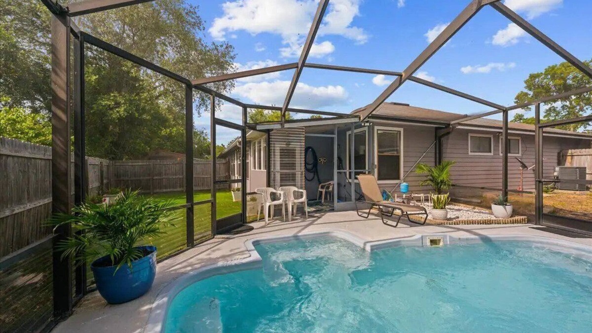 Arlington House | Sunny Florida home with a pool