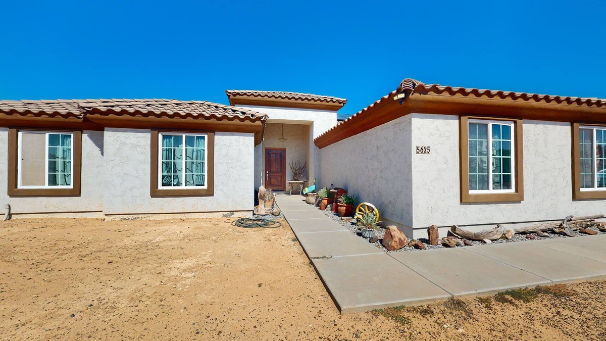 Estrella Village House | Sunny home with great backyard, home office, gym & convenient location