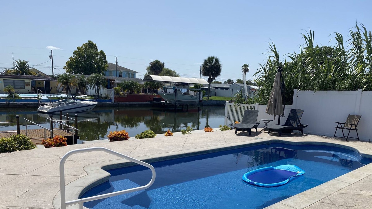 Sea Ranch On The Gulf House | Sunny Waterfront Oasis! Private Pool, Hot Tub & Dock!
