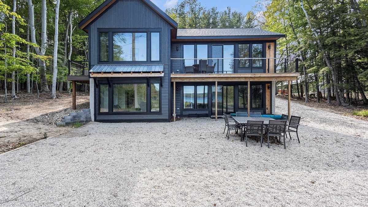 Kewadin House | 🏘️ Sunrise Sands Retreat: Beach & Dock on Torch Lake