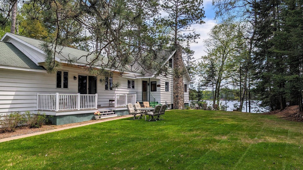 Three Lakes House | Sunrise Shores | Fun lakehome on Chain, dock, water toys, firepit, doggies ok