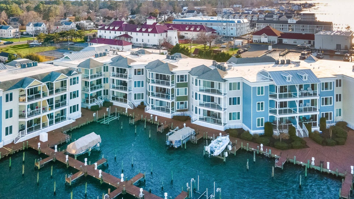 Deep Hole Condo | Sunset Bay Villa 221 - Waterfront, Pool, Gym!