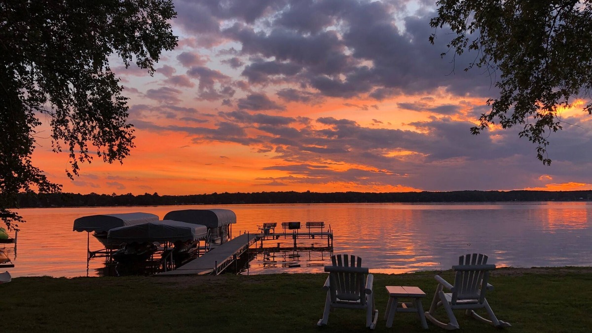 Amery Cabin | Sunset Cottage on Lake Wapogasset, Amery WI with Bunk Room, Hot Tub, AC, & more
