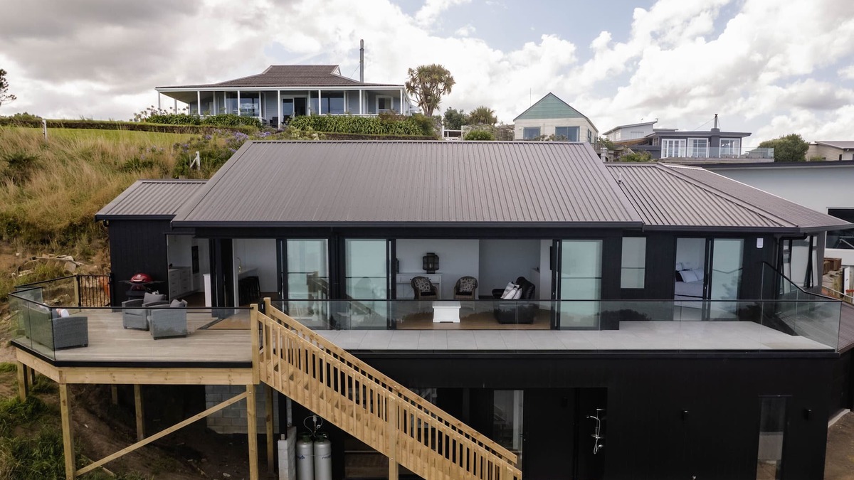 Kai Iwi House | Sunset Delight. Beautiful home with expansive sea views.