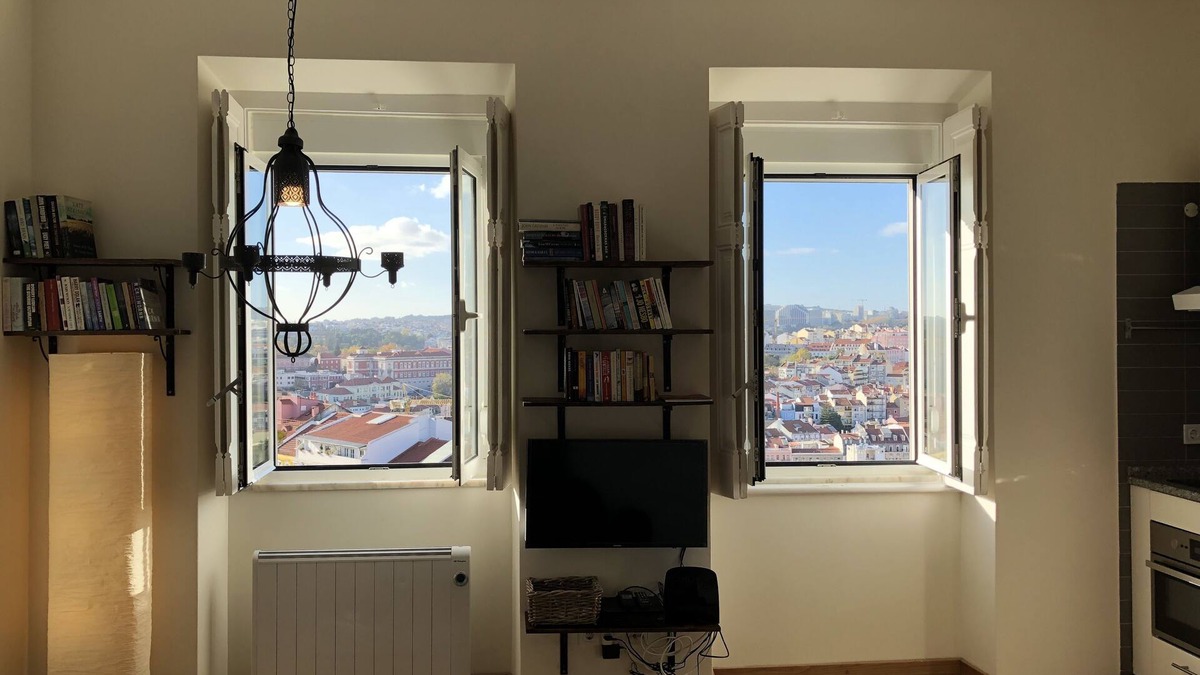 Alfama Apartment | Sunset over the roofs of Lisbon