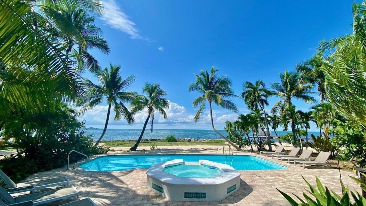 Marathon House | Sunsets in Paradise~ Gulf Front Pool Home, 22' Dock, Kayaks, Bikes & Paddleboards