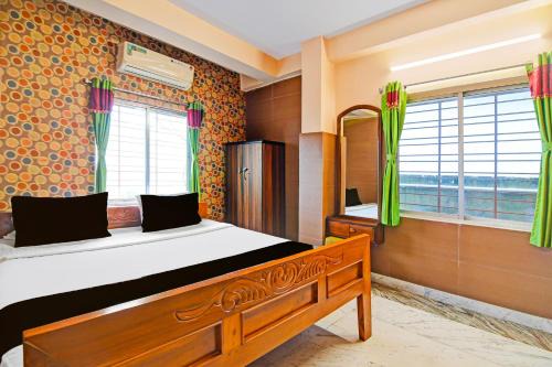 Khattalwada Hotel | Super Hotel O Rishra Railway Station Formerly Green Guest House
