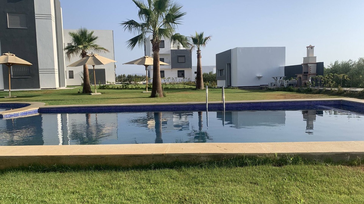 Bouficha Apartment | Superb modern app., richly furnished, pool view, lawned mountain garden