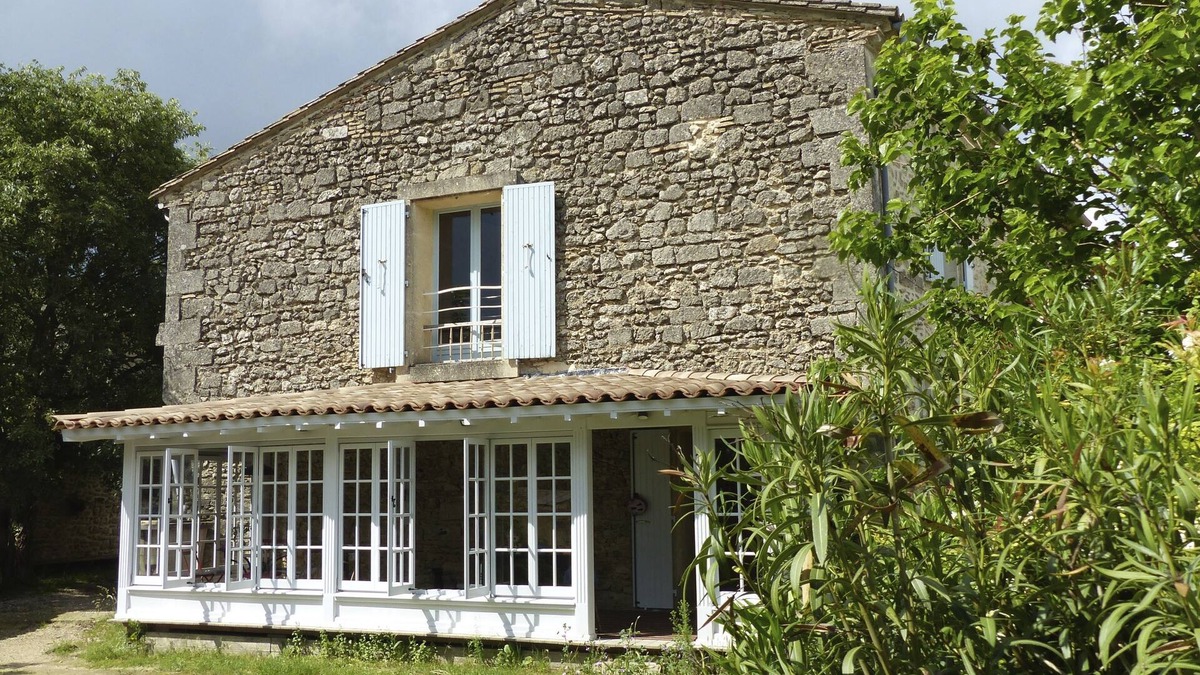 Junas Apartment | Superbly equipped apartment in old stone house with large pool and great view.