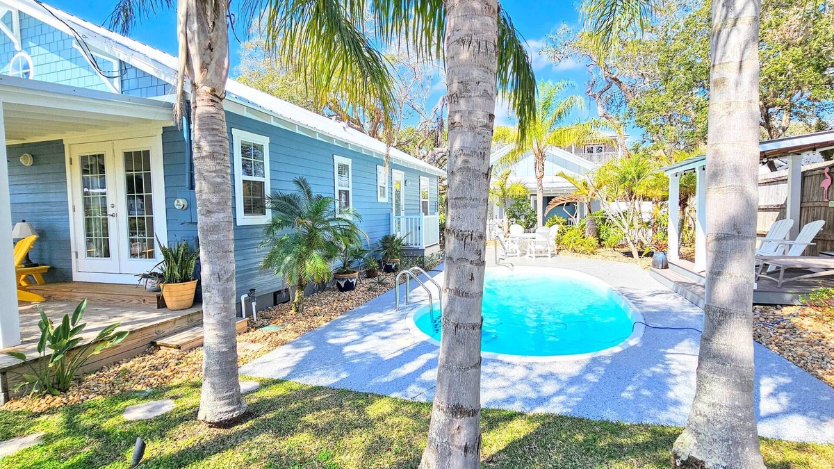 Vilano Beach House | Surfside Oasis ~Tropical Pool! Walk to the Beach! Beautiful Setting. Bikes Included!