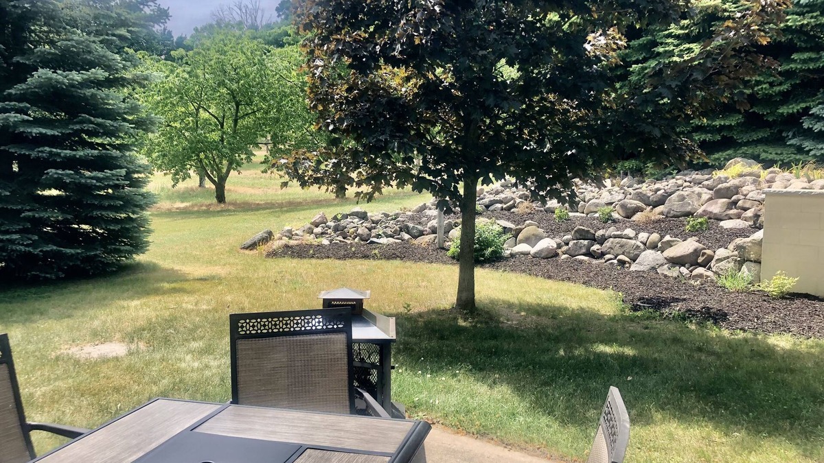 Suttons Bay House | Suttons Bay farmhouse-style home. 5 bedrooms. Air conditioning. Pet okay