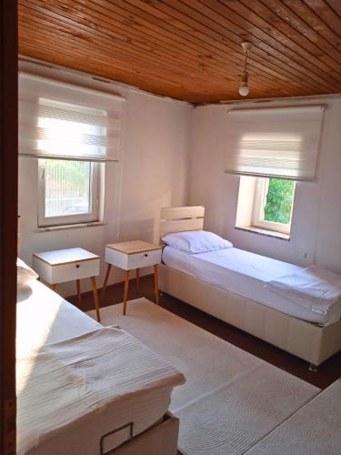 Gokceada House | Tam Merkezde Huzurlu Dublex Tatil Evi