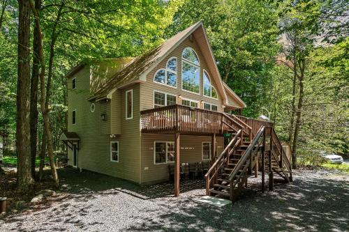 Pocono Lake House | Tawny and Peaceful Game Room Firepit PatioDeck Workspace