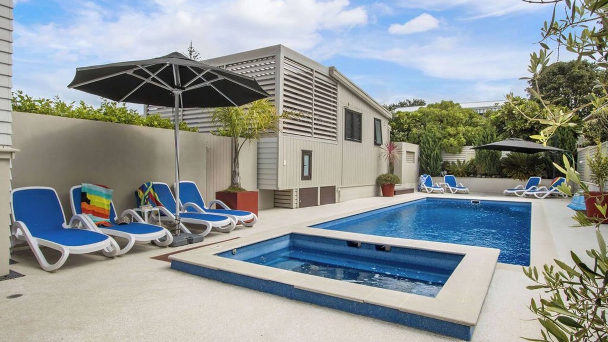 Waihi Beach Cottage | Te Mahana Cottage - pool & private spa, beachfront