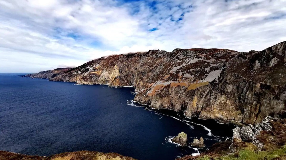 Carrick Cottage | Teach Condy's Cottage nestled at the bottom of Sliabh Liag Cliffs, Co. Donegal