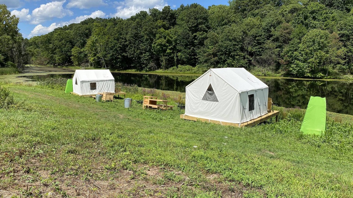Town of Marbletown RV Rental | Tentrr Signature Site - Lakeside Tents in Historic Orchard