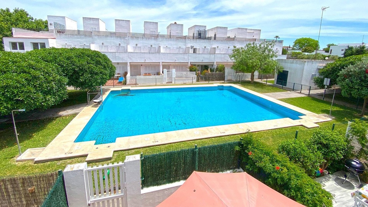 Conil de la Frontera Cottage | Terraced house with shared pool in residential area in Conil, sleeps 5