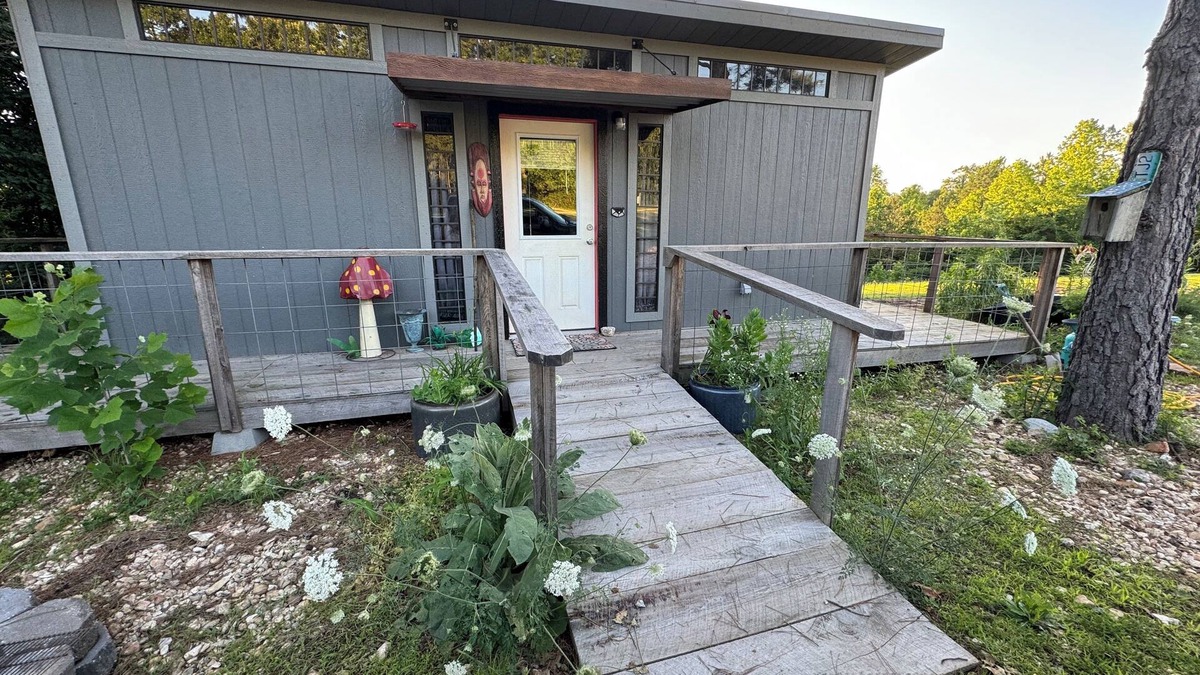 Pineville Cabin | The Adventure Center rustic tiny cabin hot tub access stage stars sunsets & pets