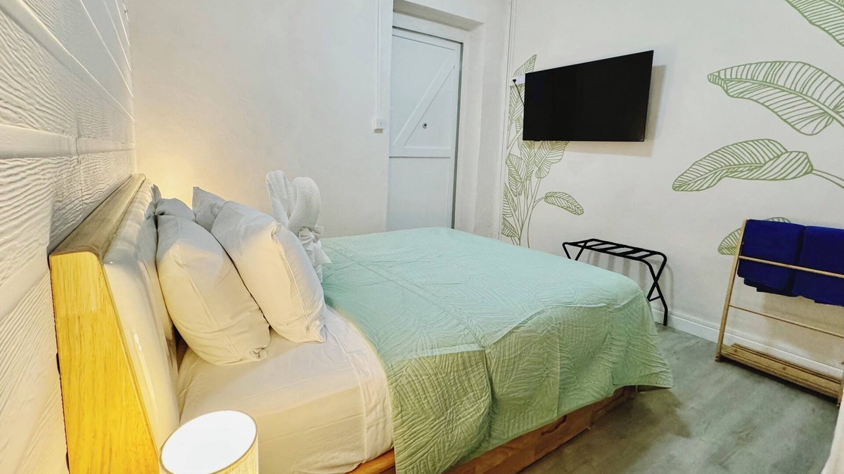 Bridgetown Hotel | The Banana Leaf room at Eden On The Sea. Beachfront, AC, WiFi.