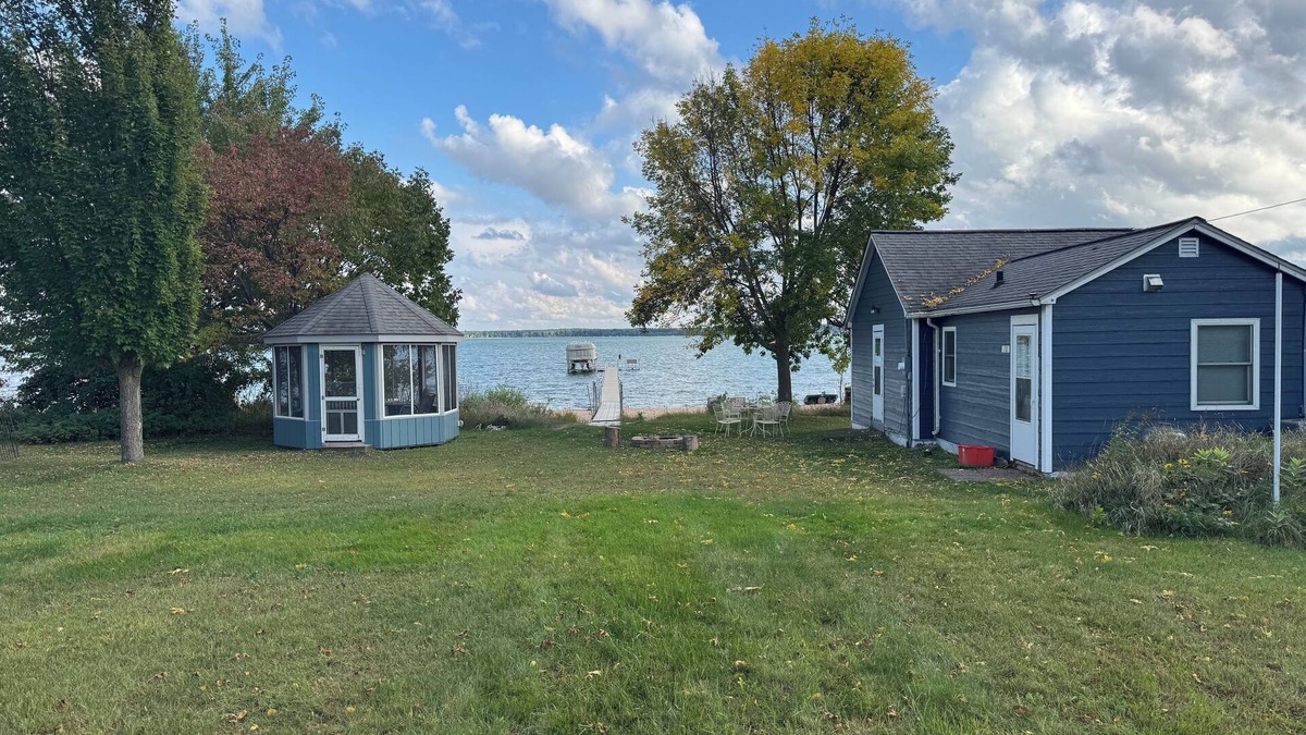 Shell Lake Cabin | The beach is calling.right outside your window. come relax and play!