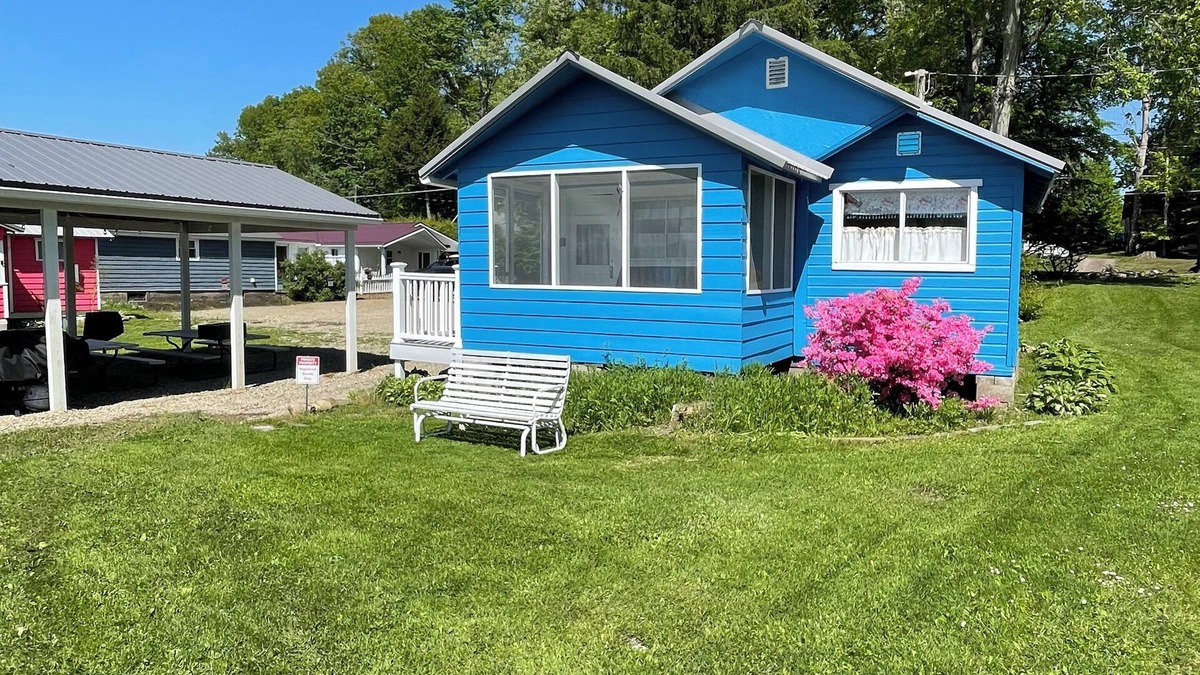 Canadohta Lake Cottage | The Bluebird, a rustic lakefront cottage at The Pier at Canadohta Lake sleeps 6!