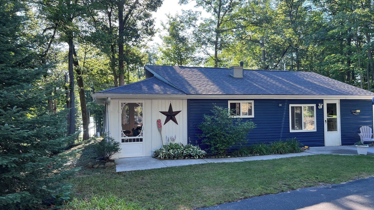 Higgins Lake Cottage | The Bluebird Cottage. Just go down 400 feet and jump in lake .
