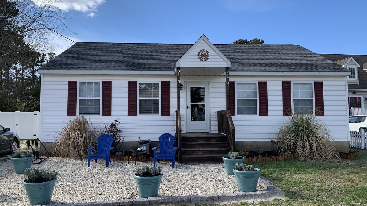 Chincoteague House | The Brass Crab - Check in/out any day!