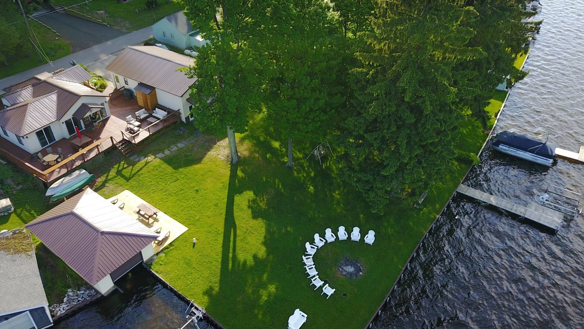 Ludington Cottage | The Bunkalow Lakefront Compound w Lifts for your Speed Boat & Tritoon
