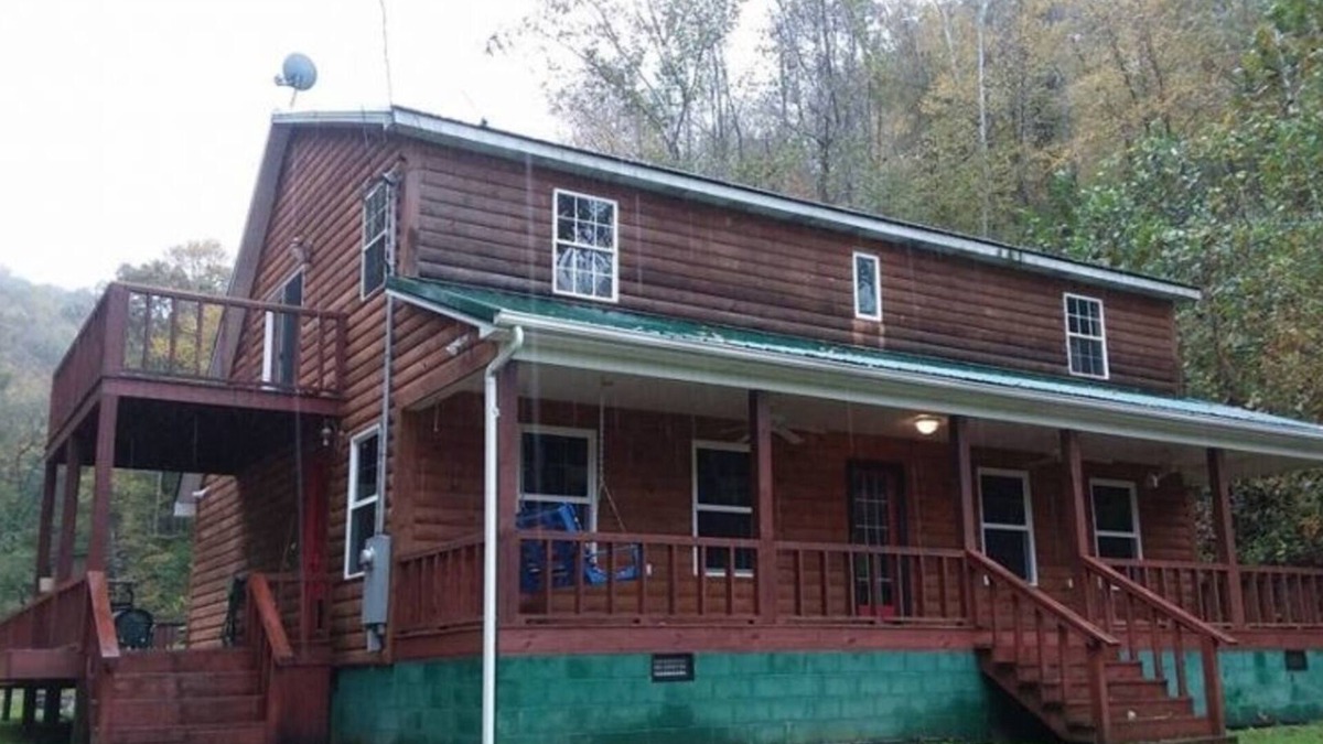 Fort Gay Cabin | The Bunkhouse A two story rustic cabin 3BR 2BA