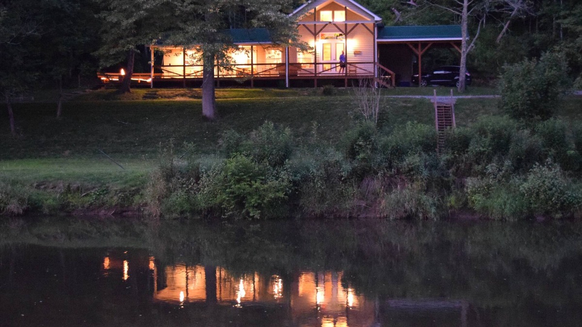 Lansing Cabin | The Cabin- Riverside Cabin Perfect For Your Family Getaway.or romantic getaway