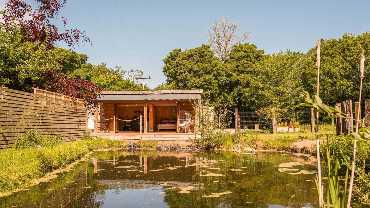 Carlisle Cabin | The Chard with hot tub overlooks a wildlife pond sleeping 2