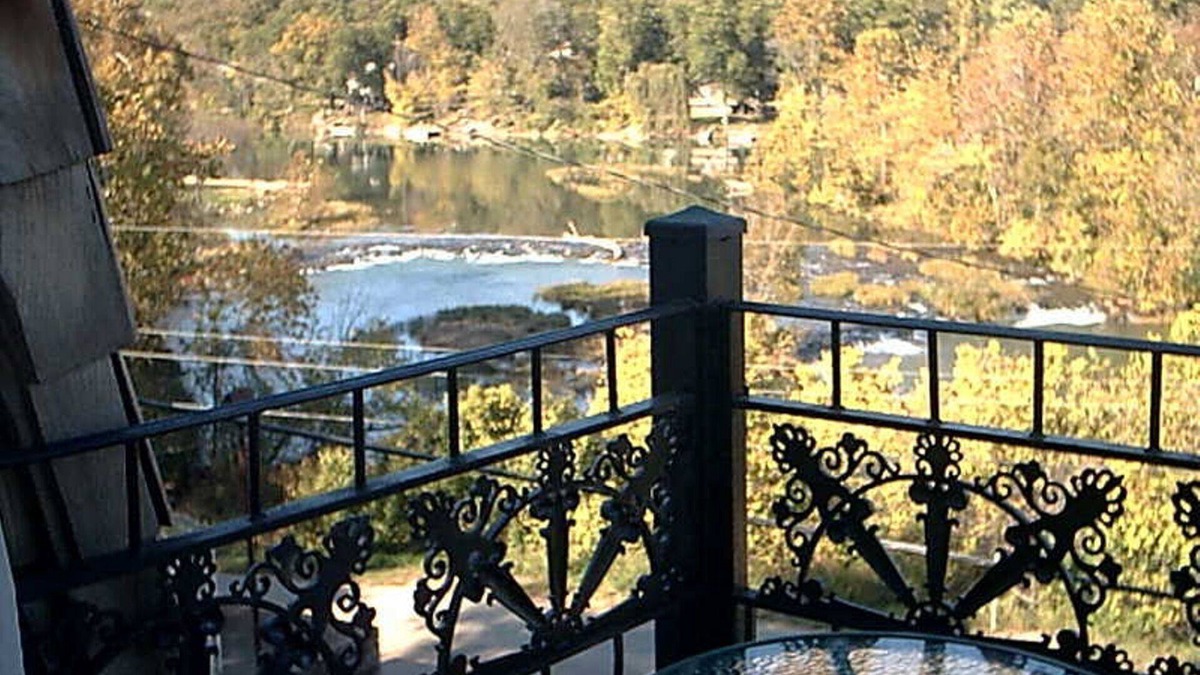 Hardy Villa | The charming French Chateau overlooks the beautiful falls of the Spring River