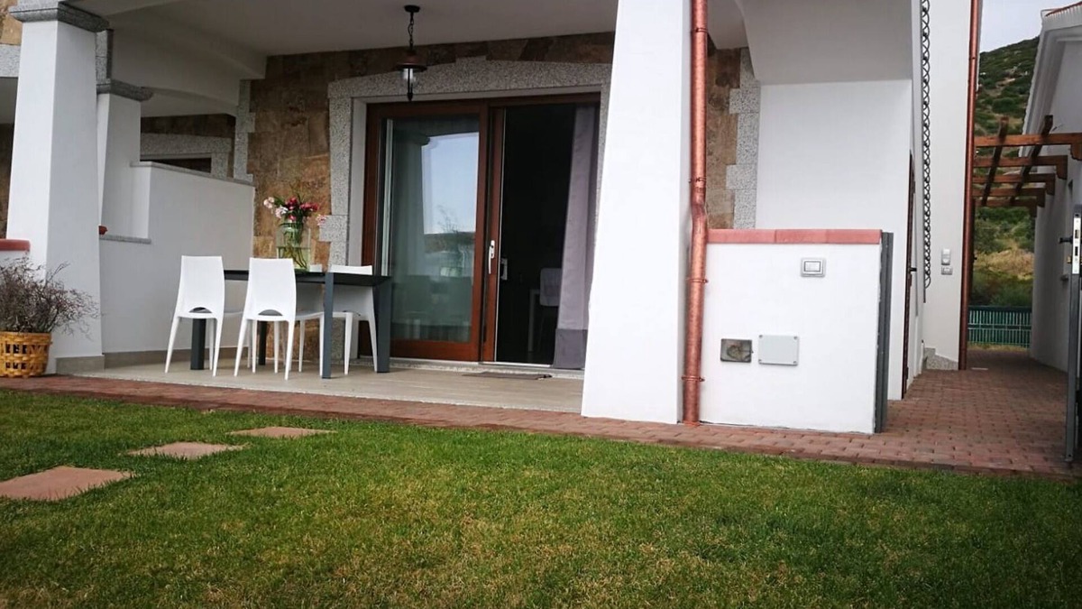 La Caletta House | The cove with sea view ground floor independent entrance with garden