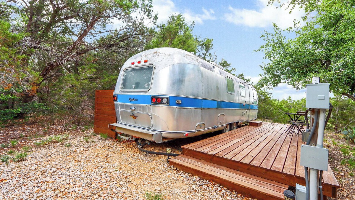 Driftwood House | The Driftwoods - Vintage Blue Airstream for Unique Driftwood Getaway