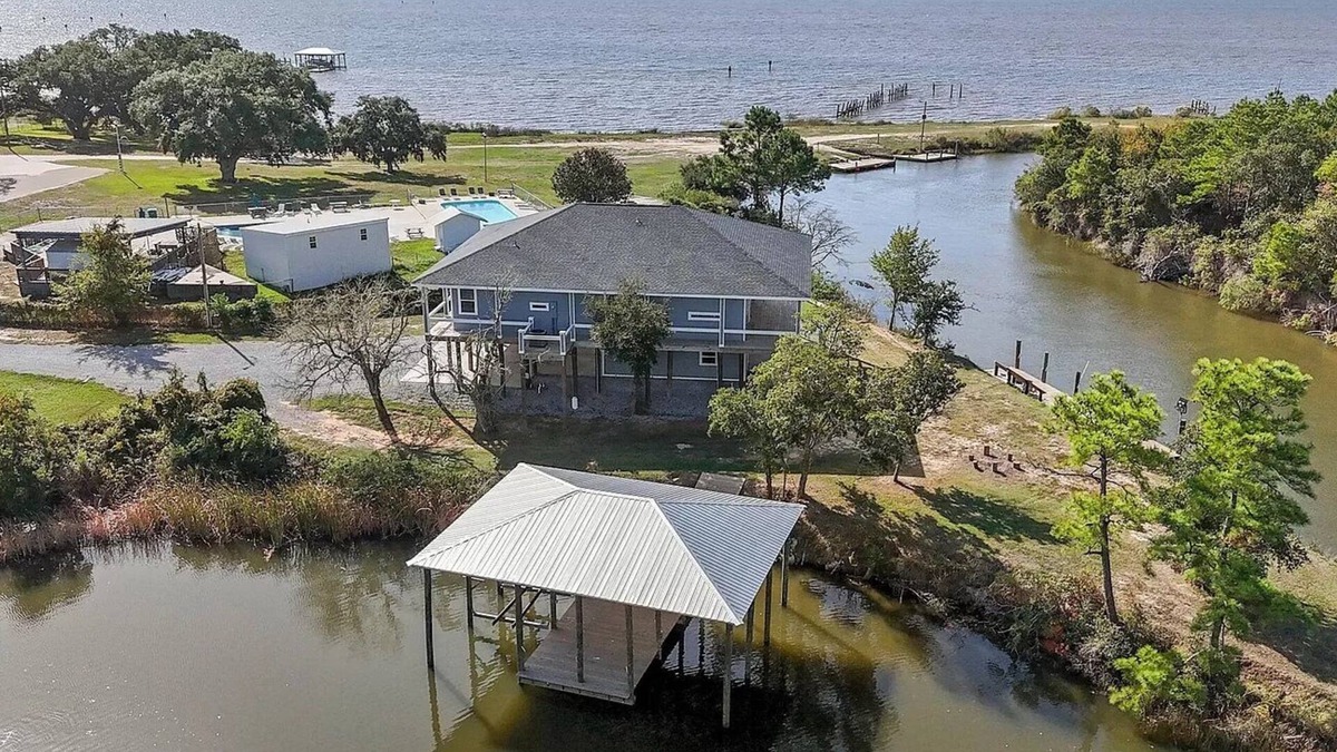 Ocean Springs Cottage | The Fin & Feather. A Gorgeous Seaside Cottage.2 docks. An incredible experience!