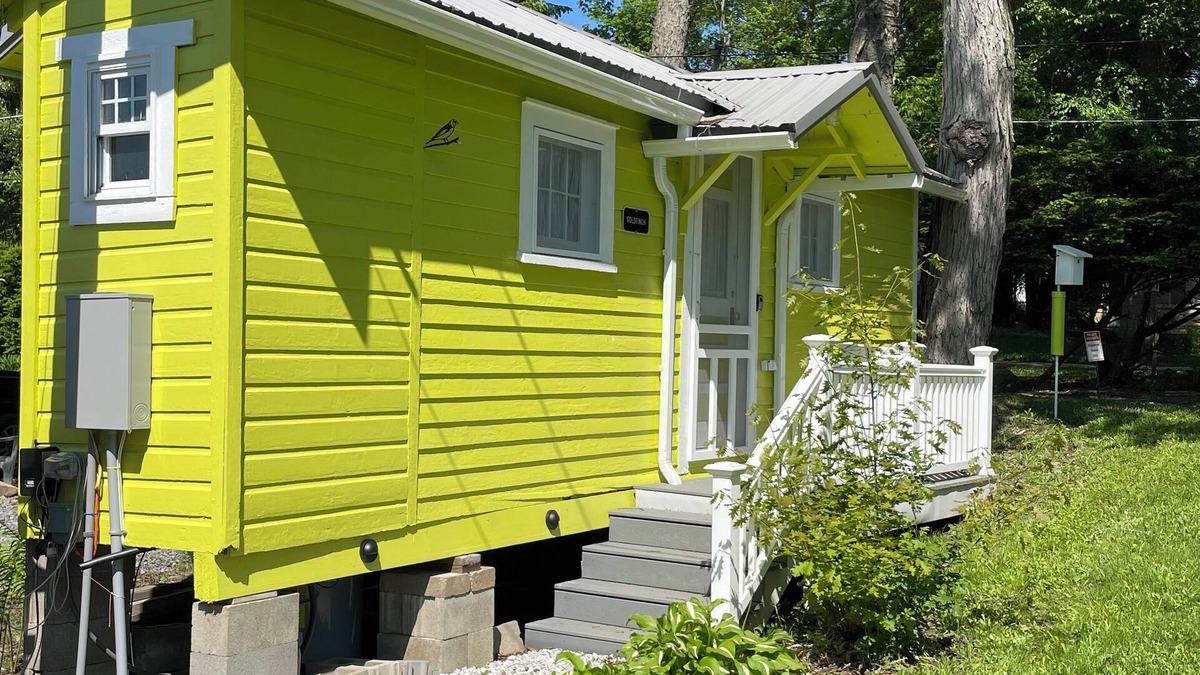 Canadohta Lake Cottage | The Goldfinch rustic lakefront cottage at The Pier at Canadohta Lake sleeps 2!
